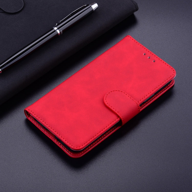 For iPhone 16e Skin Feel Pure Color Flip Leather Phone Case(Red) - iPhone 16e Cases by PMC TechLife | Online Shopping South Africa | PMC TechLife | Buy Now Pay Later Mobicred
