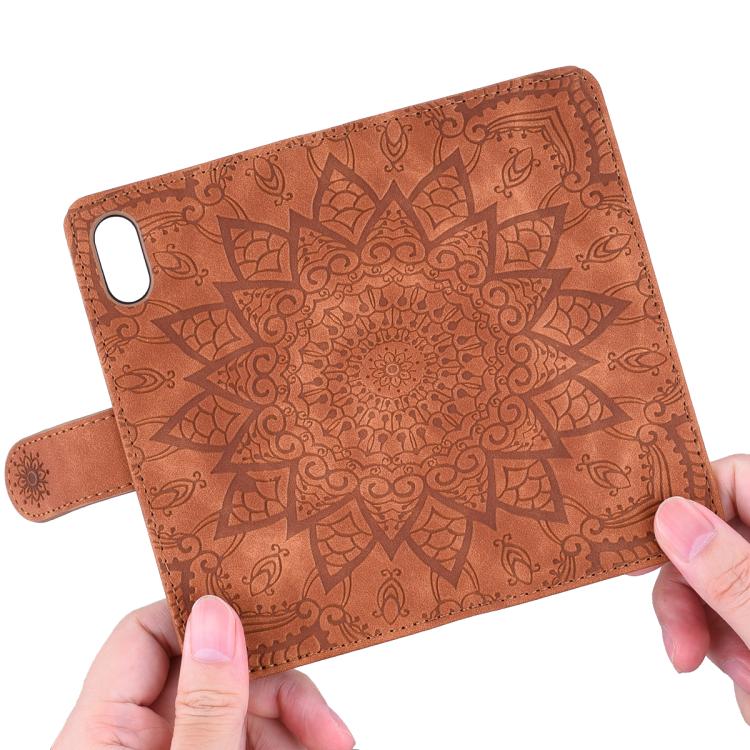 For iPhone 16e Mandala Embossed Dual-Fold Calf Leather Phone Case(Brown) - iPhone 16e Cases by PMC TechLife | Online Shopping South Africa | PMC TechLife | Buy Now Pay Later Mobicred