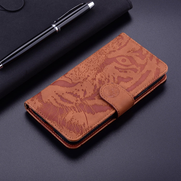 For Google Pixel 9 Tiger Embossing Pattern Flip Leather Phone Case(Brown) - Google Cases by PMC TechLife | Online Shopping South Africa | PMC TechLife | Buy Now Pay Later Mobicred