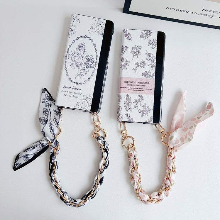 For Huawei Mate X5 / X2 Sketching Flowers Flip Leather Phone Case with Bracelet(Black) - Huawei Cases by PMC TechLife | Online Shopping South Africa | PMC TechLife | Buy Now Pay Later Mobicred