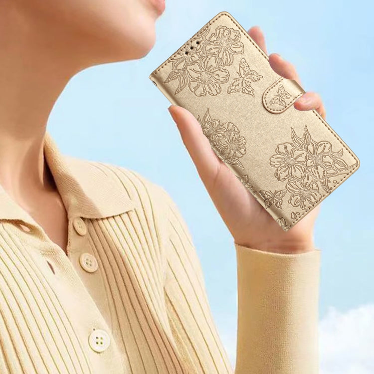 For Samsung Galaxy S25+ 5G Cherry Blossom Butterfly Skin Feel Embossed PU Phone Case(Gold) - Galaxy S25+ 5G Cases by PMC Jewellery | Online Shopping South Africa | PMC Jewellery | Buy Now Pay Later Mobicred