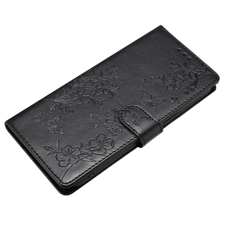 For Motorola Edge 2024 Butterflies and Flowers Leather Phone Case(Black) - Motorola Cases by PMC Jewellery | Online Shopping South Africa | PMC Jewellery | Buy Now Pay Later Mobicred