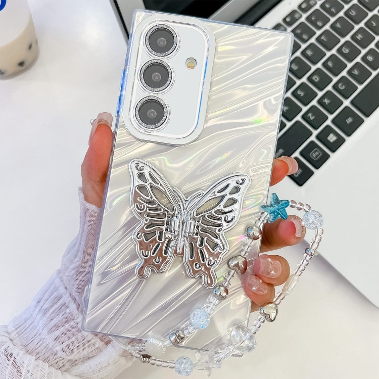 For Samsung Galaxy S25+ 5G Plating Glitter Lens Film Texture Butterfly Holder Wristband Phone Case(White Water Ripples) - free shipping - PMC Jewellery - Order now!