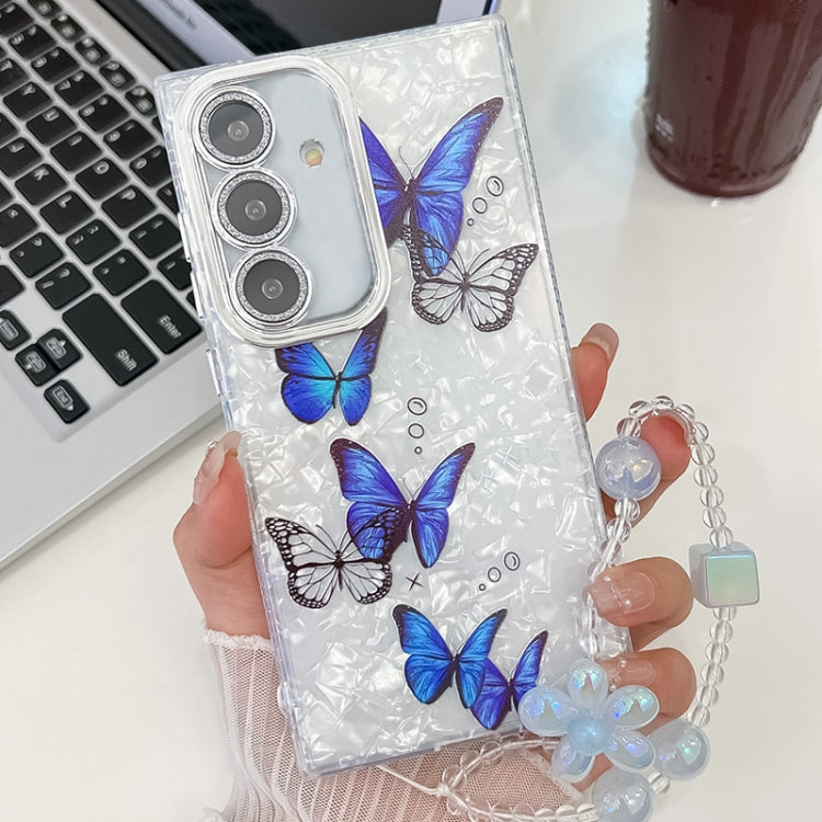 For Samsung Galaxy S25+ 5G Plating Texture Butterfly Wristband TPU Phone Case with Glitter Lens Film(Blue Butterflies HU3) - free shipping - PMC Jewellery - Order now!