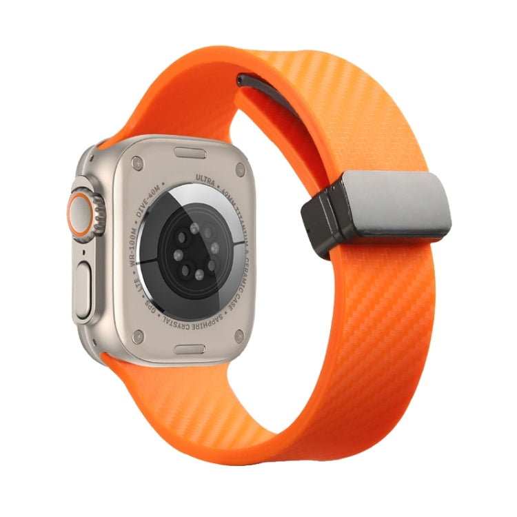 For Apple Watch 9 45mm Carbon Fiber Pattern Magnetic Buckle Silicone Watch Band(Orange) - Watch Bands by PMC TechLife | Online Shopping South Africa | PMC TechLife