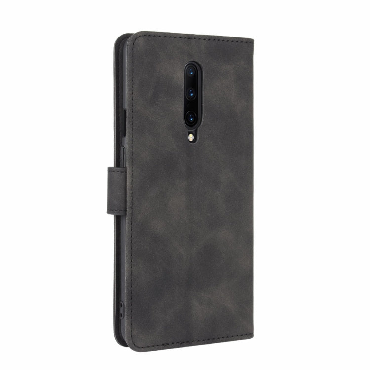 For OnePlus 7 Pro Solid Color Skin Feel Magnetic Buckle Horizontal Flip Calf Texture PU Leather Case with Holder & Card Slots & Wallet(Black) - OnePlus Cases by PMC TechLife | Online Shopping South Africa | PMC TechLife | Buy Now Pay Later Mobicred