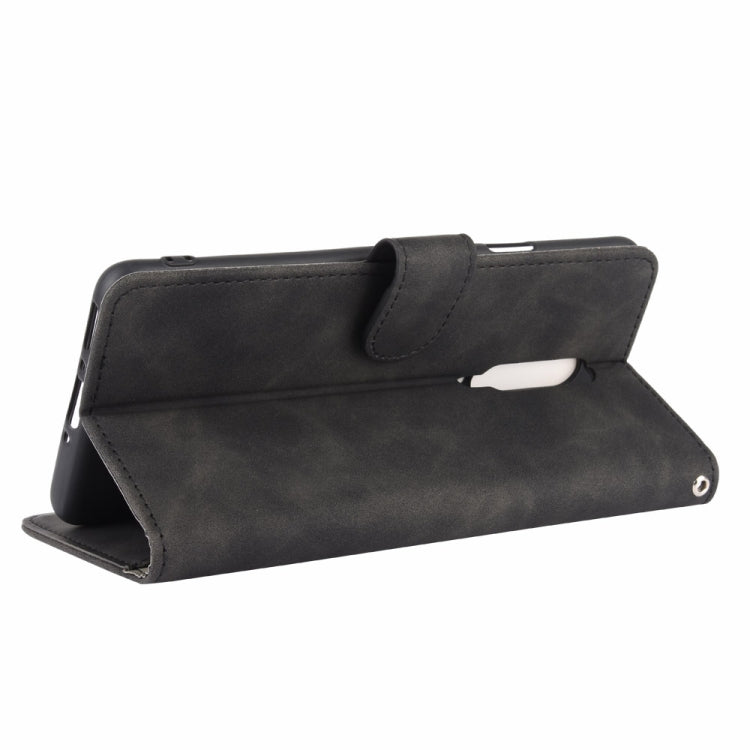 For OnePlus 7 Pro Solid Color Skin Feel Magnetic Buckle Horizontal Flip Calf Texture PU Leather Case with Holder & Card Slots & Wallet(Black) - OnePlus Cases by PMC TechLife | Online Shopping South Africa | PMC TechLife | Buy Now Pay Later Mobicred
